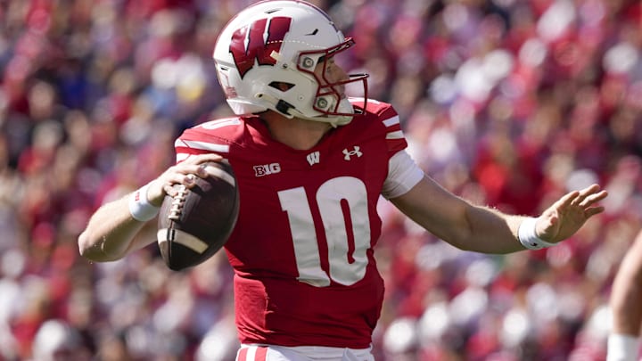 Sep 7, 2024; Madison, Wisconsin, USA; Wisconsin Badgers quarterback Tyler Van Dyke (10) throws a pass during the first quarter against the South Dakota Coyotes at Camp Randall Stadium. Mandatory Credit: Jeff Hanisch-Imagn Images Sep 7, 2024; Madison, Wisconsin, USA; Wisconsin Badgers quarterback Tyler Van Dyke (10) throws a pass during the first quarter against the South Dakota Coyotes at Camp Randall Stadium. Mandatory Credit: Jeff Hanisch-Imagn Images