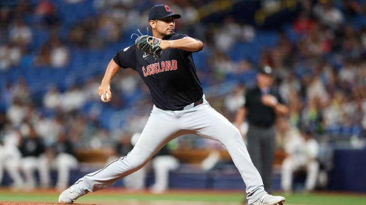 Jul 12, 2024; St. Petersburg, Florida, USA; Cleveland Guardians pitcher Carlos Carrasco (59) throws a pitch against the Tampa Bay Rays in the first inning at Tropicana Field. Mandatory Credit: Nathan Ray Seebeck-USA TODAY Sports