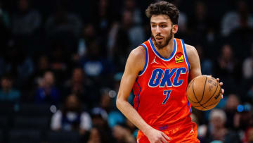 Apr 7, 2024; Charlotte, North Carolina, USA; Oklahoma City Thunder forward Chet Holmgren (7) brings the ball up court against the Charlotte Hornets at Spectrum Center. Mandatory Credit: Scott Kinser-USA TODAY Sports