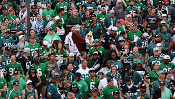 Fans wait to enter the stadium before the game between the Philadelphia Eagles and the Dallas Cowboys.