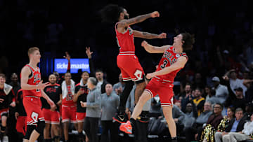 Mar 8, 2025; Miami, Florida, USA; Chicago Bulls guard Josh Giddey (3) celebrates with guard Coby White (0) after scoring against the Miami Heat during the fourth quarter at Kaseya Center. Mandatory Credit: Sam Navarro-Imagn Images