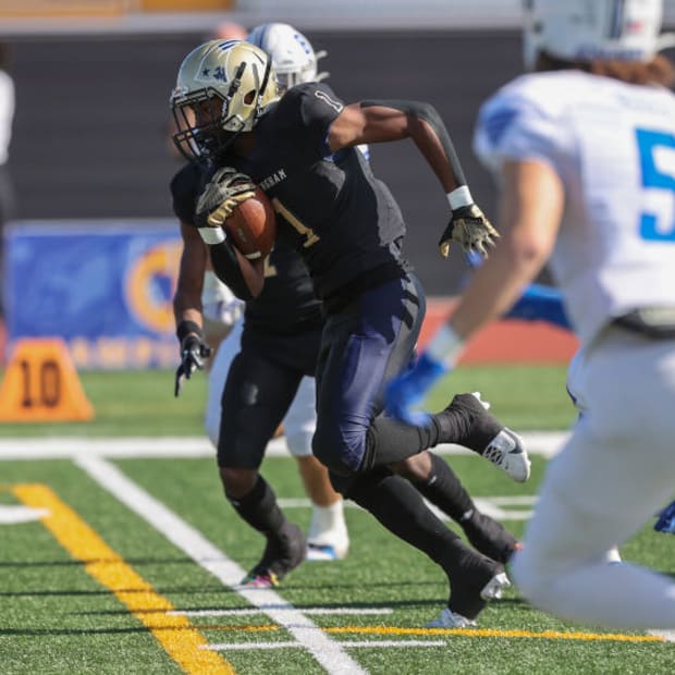 Birmingham Charter running back Dredon Fowles carrying the ball against Acalanes in the CIF State Division 3AA title game on 