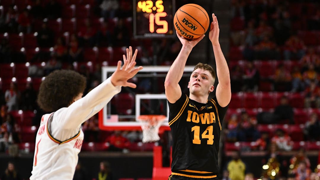 Iowa is favored against Maryland in the second round of the Big Ten Tournament.
