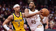 May 4, 2025; Cleveland, Ohio, USA; Cleveland Cavaliers guard Donovan Mitchell (45) drives to the basket against Indiana Pacers guard Andrew Nembhard (2) during the second half in game one of the second round for the 2025 NBA Playoffs at Rocket Arena. Mandatory Credit: Ken Blaze-Imagn Images