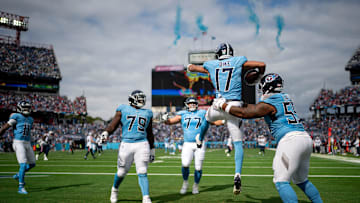 Tennessee Titans wide receiver Chimere Dike (17) celebrates his touchdown against the New England Patriots during the first quarter at Nissan Stadium in Nashville, Tenn., Sunday, Oct. 19, 2025.