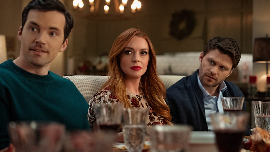 Our Little Secret. (L-R) Ian Harding as Logan, Lindsay Lohan as Avery and Jon Rudnitsky as Cameron in Our Little Secret. Cr. Bob Mahoney/Netflix © 2024
