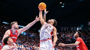 Mar 8, 2025; Lawrence, Kansas, USA; Arizona Wildcats forward Tobe Awaka (30) rebounds during the second half against the Kansas Jayhawks at Allen Fieldhouse. Mandatory Credit: William Purnell-Imagn Images