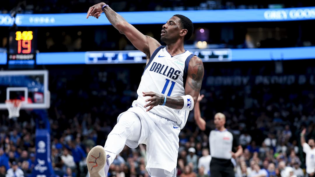 Feb 27, 2025; Dallas, Texas, USA;  Dallas Mavericks guard Kyrie Irving (11) reacts after shooting against the Charlotte Hornets during the second half at American Airlines Center. Mandatory Credit: Kevin Jairaj-Imagn Images