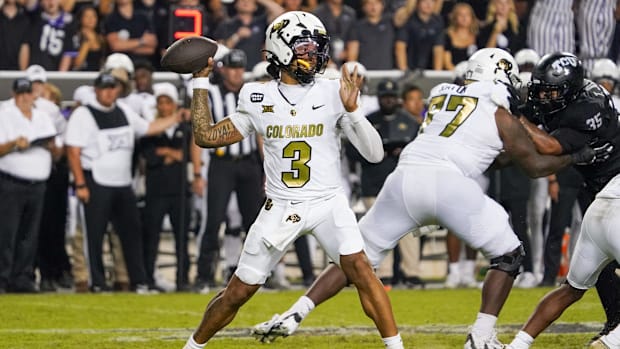 Colorado Buffaloes quarterback Kaidon Salter (3) throws downfield against the TCU Horned Frogs during the second half at Amon