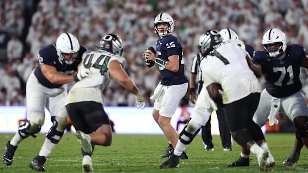 Penn State Nittany Lions quarterback Drew Allar looks downfield prior to throwing a pass against the Oreegon Ducks.