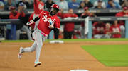 Cincinnati Reds shortstop Elly De La Cruz rounds second and would go on to score on Tyler Stephenson's double in the seventh inning against the Dodgers in a National League wild card series game in Los Angeles on Sept. 30.
