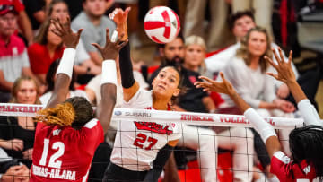 Oct 21, 2023; Lincoln, NE, USA; Nebraska Cornhuskers outside hitter Harper Murray (27) attacks against Wisconsin Badgers outside hitter Temi Thomas-Ailara (12) during the fourth set at the Bob Devaney Sports Center.