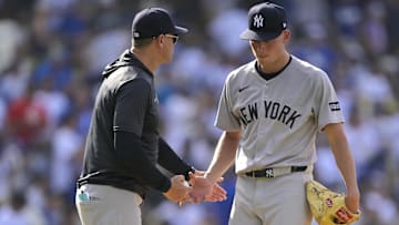 May 31, 2025; Los Angeles, California, USA; New York Yankees manager Aaron Boone relieves pitcher Will Warren (98) in the second inning against the Los Angeles Dodgers at Dodger Stadium. Mandatory Credit: Jayne Kamin-Oncea-Imagn Images