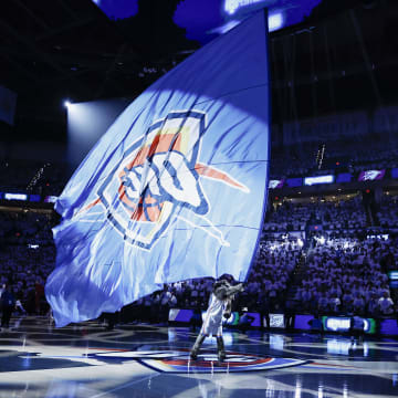 Apr 21, 2024; Oklahoma City, Oklahoma, USA; Oklahoma City Thunder mascot Rumble the Bison waves a giant flag before the start of game one of the first round for the 2024 NBA playoffs at Paycom Center. Mandatory Credit: Alonzo Adams-USA TODAY Sports