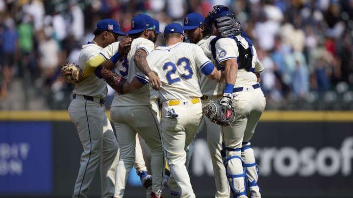 Seattle Mariners players dance after the win over the Houston Astros at T-Mobile Park on July 21.