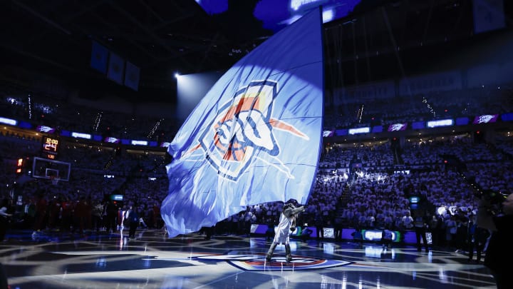 Apr 21, 2024; Oklahoma City, Oklahoma, USA; Oklahoma City Thunder mascot Rumble the Bison waves a giant flag before the start of game one of the first round for the 2024 NBA playoffs at Paycom Center. Mandatory Credit: Alonzo Adams-USA TODAY Sports