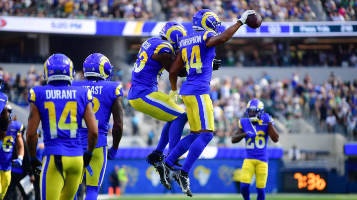 Oct 8, 2023; Inglewood, California, USA; Los Angeles Rams cornerback Ahkello Witherspoon (44) celebrates his interception against the Philadelphia Eagles with linebacker Ernest Jones (53) during the second half at SoFi Stadium. Mandatory Credit: Gary A. Vasquez-USA TODAY Sports