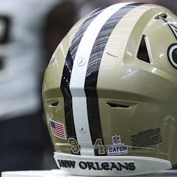 Oct 15, 2023; Houston, Texas, USA; View of a Crucial Catch logo on the helmet of New Orleans Saints defensive end Cameron Jordan (94) before the game against the Houston Texans at NRG Stadium. Mandatory Credit: Troy Taormina-Imagn Images