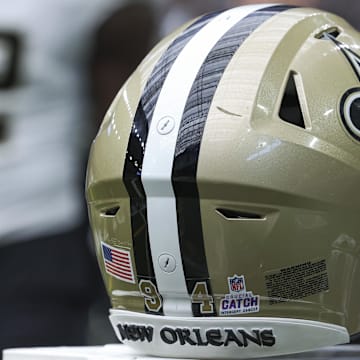 Oct 15, 2023; Houston, Texas, USA; View of a Crucial Catch logo on the helmet of New Orleans Saints defensive end Cameron Jordan (94) before the game against the Houston Texans at NRG Stadium. Mandatory Credit: Troy Taormina-Imagn Images