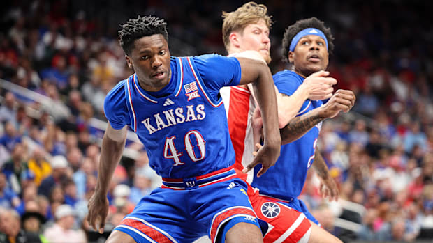 Kansas basketball battles for a rebound against Arizon