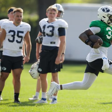 Gerry Bohanon runs down the sideline at BYU Fall camp