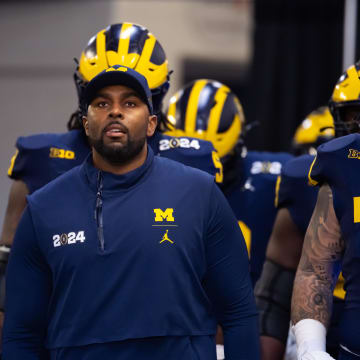 Jan 8, 2024; Houston, TX, USA; Michigan Wolverines offensive coordinator Sherrone Moore against the Washington Huskies during the 2024 College Football Playoff national championship game at NRG Stadium. Mandatory Credit: Mark J. Rebilas-USA TODAY Sports