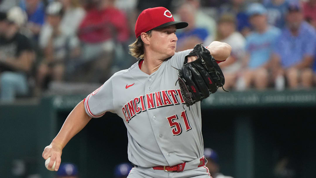 Cincinnati Reds pitcher Brady Singer (51) delivers a pitch