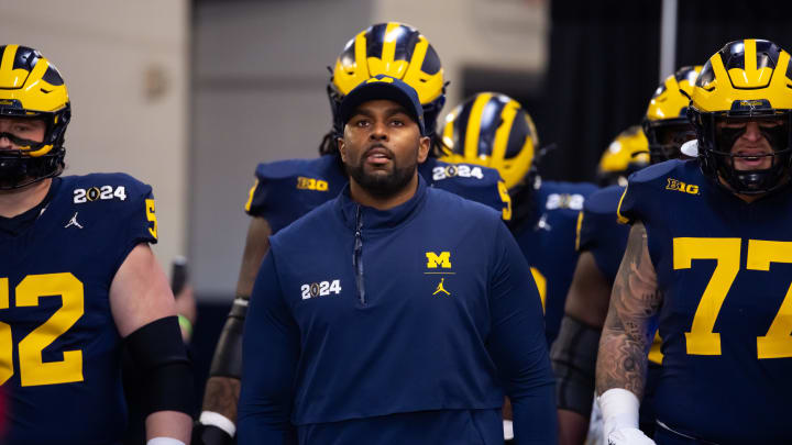 Jan 8, 2024; Houston, TX, USA; Michigan Wolverines offensive coordinator Sherrone Moore against the Washington Huskies during the 2024 College Football Playoff national championship game at NRG Stadium. Mandatory Credit: Mark J. Rebilas-USA TODAY Sports