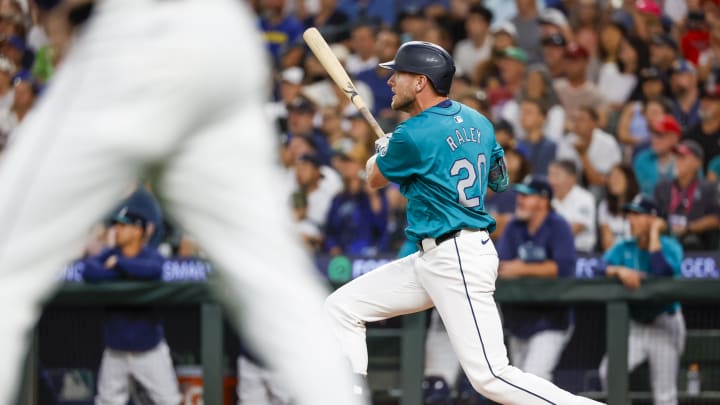 Seattle Mariners left fielder Luke Raley (20) hits a two-run double against the Philadelphia Phillies during the sixth inning at T-Mobile Park on Aug 3.