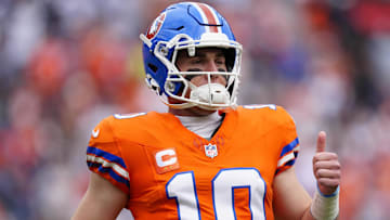 Oct 26, 2025; Denver, Colorado, USA; Denver Broncos quarterback Bo Nix (10) reacts in the first quarter against the Dallas Cowboys at Empower Field at Mile High. 