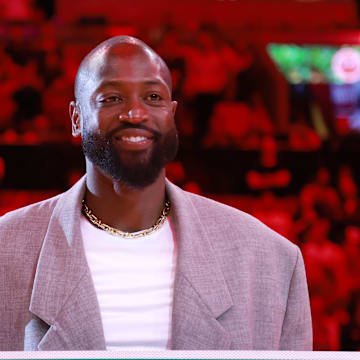 Oct 28, 2024; Miami, Florida, USA;  Former Miami Heat guard Dwyane Wade is honored with 'Dwayne Wade Blvd' at halftime during a game against the Detroit Pistons at Kaseya Center. Mandatory Credit: Rhona Wise-Imagn Images