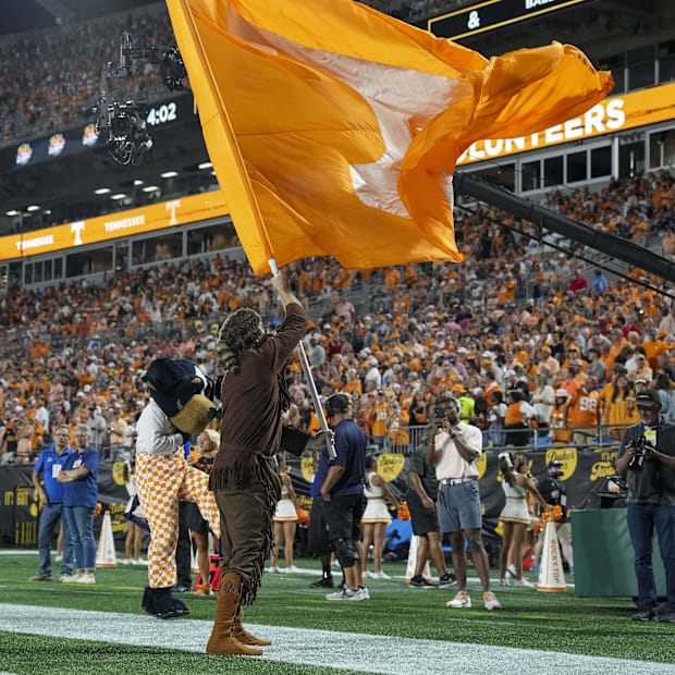 Tennessee Volunteers mascots the Volunteer and Smoky celebrate a touchdown during the second half against the NC State.