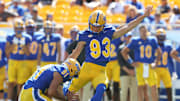Aug 30, 2025; Pittsburgh, Pennsylvania, USA; Pittsburgh Panthers place kicker Trey Butkowski (93) kicks a field goal from the hold of punter Caleb Junko (91) against the Duquesne Dukes during the fourth quarter at Acrisure Stadium. Mandatory Credit: Charles LeClaire-Imagn Images