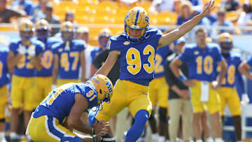 Aug 30, 2025; Pittsburgh, Pennsylvania, USA; Pittsburgh Panthers place kicker Trey Butkowski (93) kicks a field goal from the hold of punter Caleb Junko (91) against the Duquesne Dukes during the fourth quarter at Acrisure Stadium. Mandatory Credit: Charles LeClaire-Imagn Images