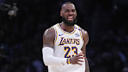 Dec 15, 2024; Los Angeles, California, USA; Los Angeles Lakers forward LeBron James (23) reacts in the first half against the Memphis Grizzlies at Crypto.com Arena. Mandatory Credit: Kirby Lee-Imagn Images