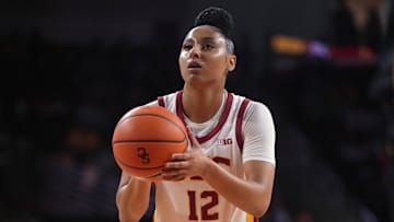 Dec 29, 2024; Los Angeles, California, USA; Southern California Trojans guard JuJu Watkins (12) shoots a free throw against the Michigan Wolverines in the first half at Galen Center. Mandatory Credit: Kirby Lee-Imagn Images