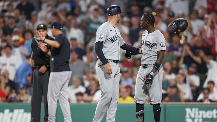 Jun 28, 2026; Boston, Massachusetts, USA; New York Yankees second baseman Jazz Chisholm Jr (13) argues with home plate umpire Adam Hamari (78) during the sixth inning against the Boston Red Sox at Fenway Park. Mandatory Credit: Paul Rutherford-Imagn Images