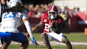 Nov 22, 2025; Tuscaloosa, Alabama, USA;  Alabama running back Jam Miller (26) attempts to cut back against Eastern Illinois defensive back Isaiah Houi (23) at Saban Field at Bryant-Denny Stadium. Mandatory Credit: Gary Cosby Jr.-Imagn Images