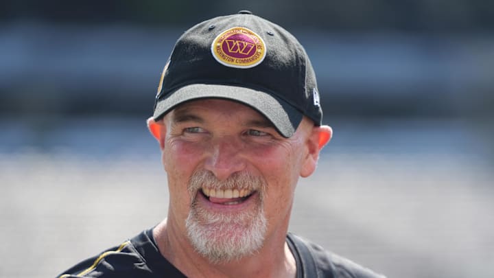 Aug 10, 2024; East Rutherford, New Jersey, USA; Washington Commanders head coach Dan Quinn smiles before the game against the New York Jets at MetLife Stadium. Mandatory Credit: Lucas Boland-Imagn Images