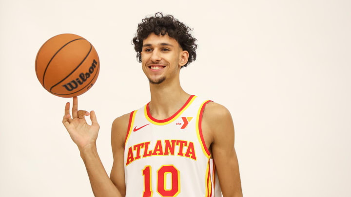 Jun 28, 2024; Atlanta, Georgia, USA; Atlanta Hawks first overall draft pick Zaccharie Risacher (10) poses for a photo at the Emory Sports Medicine Complex. Mandatory Credit: Brett Davis-USA TODAY Sports