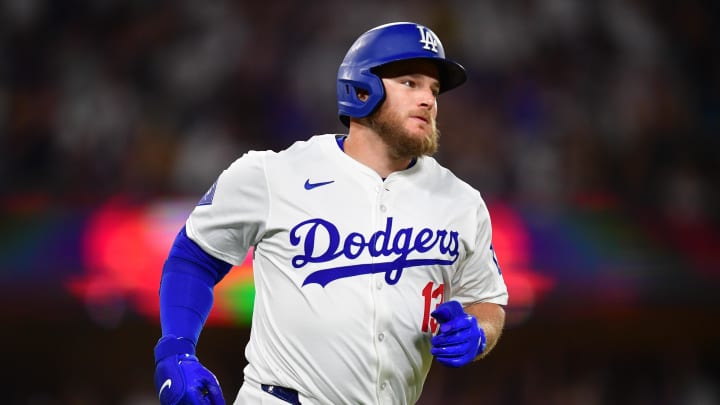 Aug 19, 2024; Los Angeles, California, USA; Los Angeles Dodgers third baseman Max Muncy (13) runs the bases after hitting a two run home run against the Seattle Mariners during the seventh inning at Dodger Stadium. Mandatory Credit: Gary A. Vasquez-USA TODAY Sports