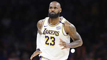 Apr 6, 2025; Oklahoma City, Oklahoma, USA;Los Angeles Lakers forward LeBron James (23) reacts after scoring against the Oklahoma City Thunder during the second half at Paycom Center. Mandatory Credit: Alonzo Adams-Imagn Images