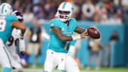 Oct 30, 2025; Miami Gardens, Florida, USA; Miami Dolphins quarterback Tua Tagovailoa (1) throws downfield during the fourth quarter against the Baltimore Ravens at Hard Rock Stadium. Mandatory Credit: Nathan Ray Seebeck-Imagn Images