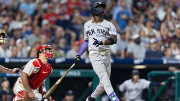 Jul 30, 2024; Philadelphia, Pennsylvania, USA; New York Yankees third base Jazz Chisholm Jr. (13) hits a three RBI home run during the seventh inning against the Philadelphia Phillies at Citizens Bank Park. Mandatory Credit: Bill Streicher-USA TODAY Sports