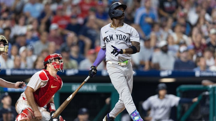 Jul 30, 2024; Philadelphia, Pennsylvania, USA; New York Yankees third base Jazz Chisholm Jr. (13) hits a three RBI home run during the seventh inning against the Philadelphia Phillies at Citizens Bank Park. Mandatory Credit: Bill Streicher-USA TODAY Sports