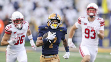 Sep 27, 2025; Morgantown, West Virginia, USA; West Virginia Mountaineers wide receiver Jarod Bowie (7) runs for extra yards during the fourth quarter against the Utah Utes at Milan Puskar Stadium. Mandatory Credit: Ben Queen-Imagn Images