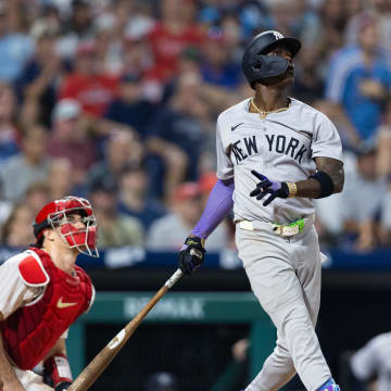 Jul 30, 2024; Philadelphia, Pennsylvania, USA; New York Yankees third base Jazz Chisholm Jr. (13) hits a three RBI home run during the seventh inning against the Philadelphia Phillies at Citizens Bank Park.