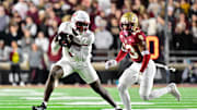 Oct 25, 2024; Chestnut Hill, Massachusetts, USA; Louisville Cardinals wide receiver Chris Bell (0) runs after making a catch against the Boston College Eagles during the first half at Alumni Stadium. Mandatory Credit: Eric Canha-Imagn Images