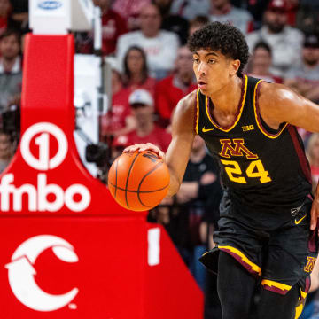 Feb 25, 2024; Lincoln, Nebraska, USA; Minnesota Golden Gophers guard Cam Christie (24) dribbles the ball against the Nebraska Cornhuskers during the second half at Pinnacle Bank Arena. Mandatory Credit: Dylan Widger-USA TODAY Sports