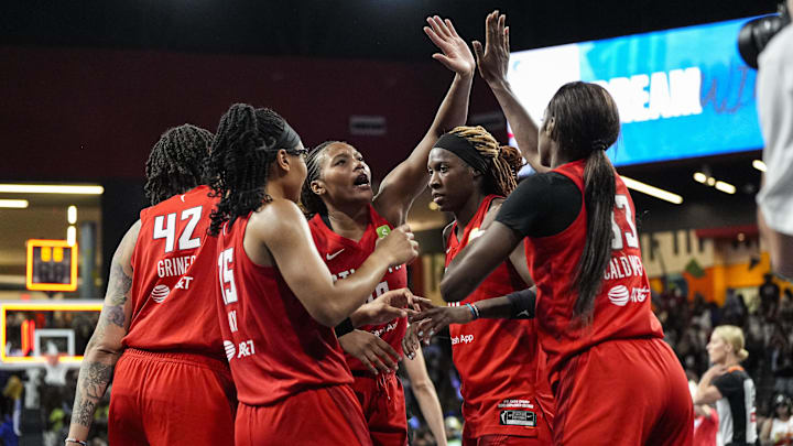 Aug 21, 2025; College Park, Georgia, USA; Atlanta Dream players react on the court after defeating the Minnesota Lynx at Gateway Center Arena at College Park. Mandatory Credit: Dale Zanine-Imagn Images